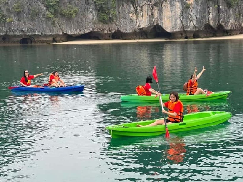 Halong Bay: Full-Day Cruise with Swimming, Meal and Kayaking - Boarding the cruise at Tuan Chau