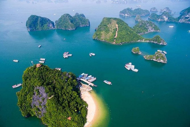 Halong Bay Full Day Tour with All-Inclusive: Boat, Kayak, Island, Cave and Lunch - Cruising among Halong Bay’s limestone towers