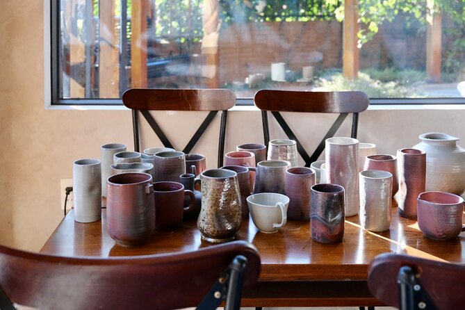 Halong Bay: Fun pottery workshops with local artists - Decorating your piece after shaping