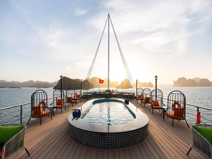 Halong Bay: Luxury Day Cruise w/ Pool, Kayak, Free Transfer - Boarding a modern cruise with a pool