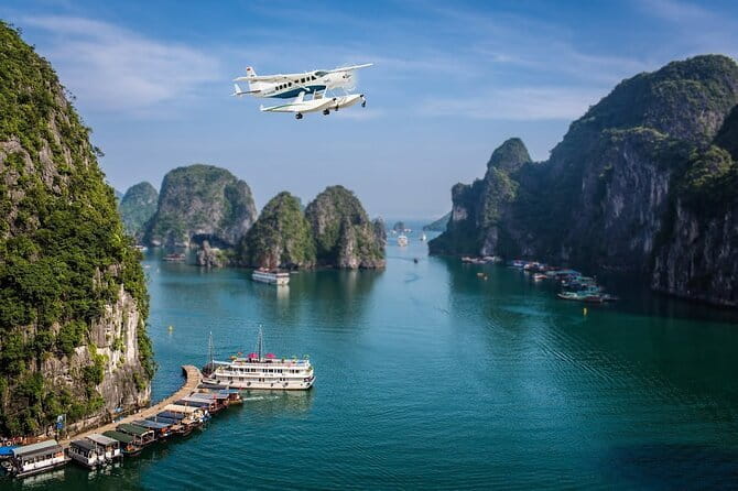 Halong Bay Sightseeing with Seaplane 25 Minutes on the Sky - Looking over Bo Hon Island and its caves