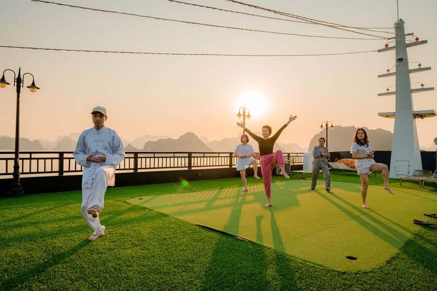 Hanoi: 2-Day Ha Long Bay 4-Star Cruise with Titov Cave - Day two: sunrise, breakfast, and Sung Sot Cave