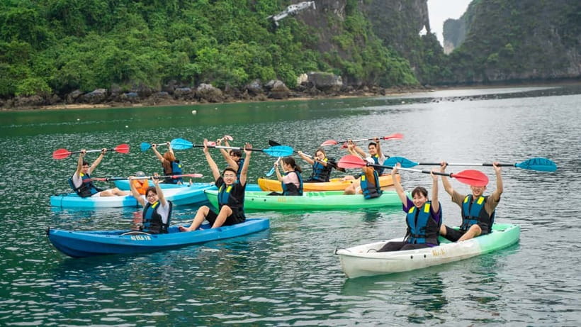 Hanoi: 2-Day Halong-Lan Ha Bay BEST SELLER 5<em> cruise balcony – Key points to know before booking’ /></p>
<ul>
<li><strong>Private balcony junior suite:</strong> Your air-conditioned ensuite cabin includes a balcony, though second-floor rooms cost extra.</li>
<li><strong>Two bays in one short trip:</strong> The route covers Halong Bay and Lan Ha Bay, with cave, beach, and kayaking options.</li>
<li><strong>Activity choices depend on the day:</strong> Dark and Bright Cave, Ba Trai Dao Beach, Trung Trang or Quan Y Cave, and Tra Bau may be scheduled according to conditions.</li>
<li><strong>Meals and activities are included:</strong> Lunch, dinner, breakfast, brunch, kayaking, swimming stops, cooking class, tai chi, and squid fishing are covered.</li>
<li><strong>Hanoi transport is built in:</strong> Pickup is provided from Hanoi Old Quarter, with pickup from Tam Coc and Trang An areas also available.</li>
<li><strong>A good fit for active couples:</strong> Honeymoon decorations and birthday cake are available with advance notice, and guide Minh has received praise for attentive service.</li>
</ul>
<h2>What this Halong and Lan Ha Bay cruise is really like</h2>
<p><img width="820" height="547" decoding="async" src=
