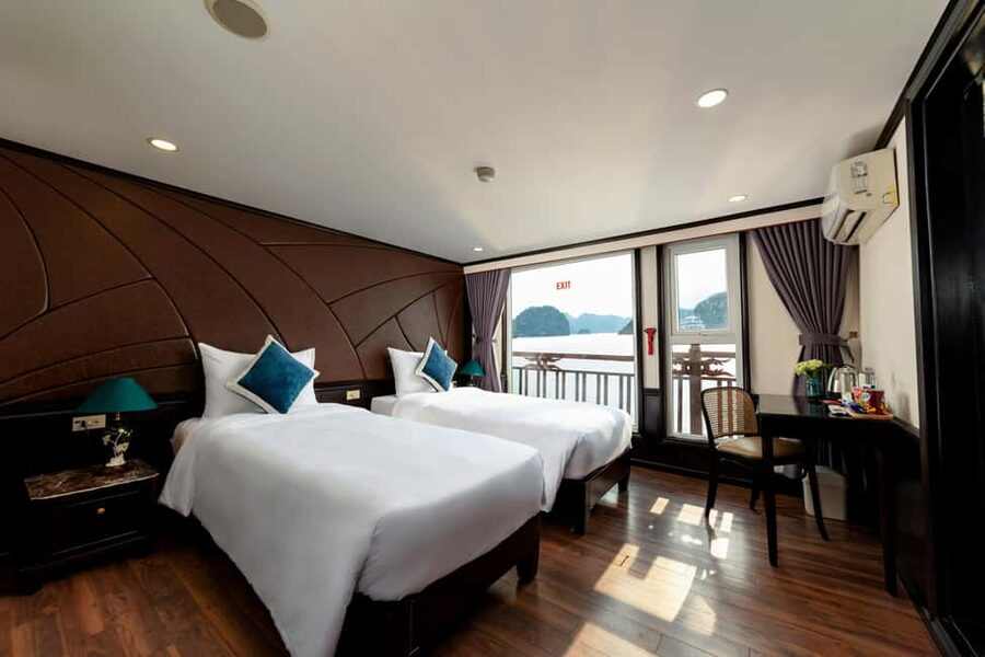 Hanoi: 3-Day 2-Night Ha Long Bay and Lan Ha Bay Cruise - The full middle day: Trinh Nu Cave, Three Peach Beach, and pearls