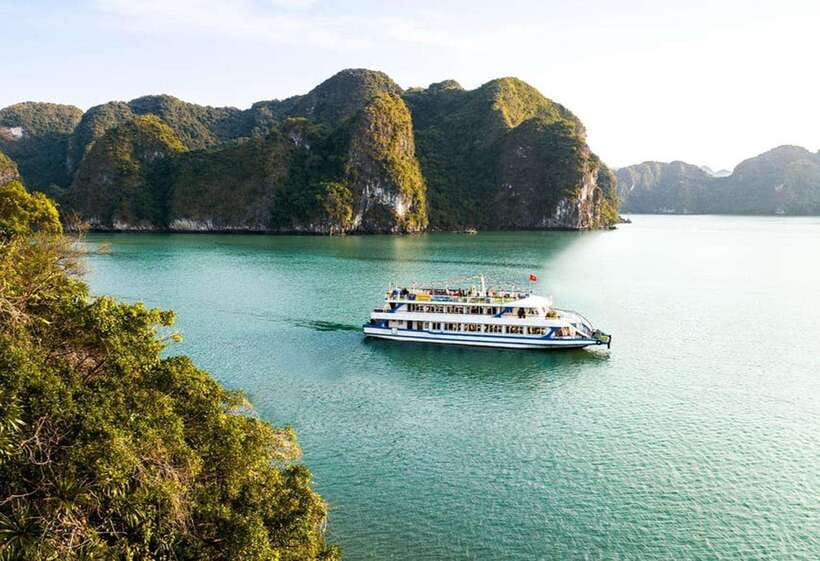 Hanoi: Full-Day Halong Bay Cruise with Kayak, Caves & Lunch - Leaving Hanoi and reaching Tuan Chau Harbor