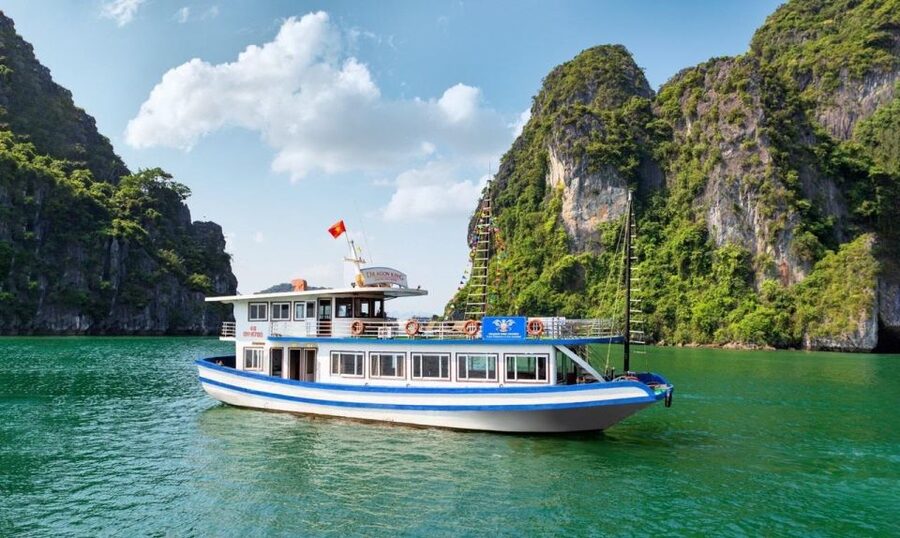 Hanoi: Halong Bay Day Trip with Titop Island, Cave, & Kayak - The Hanoi pickup and long road to Tuan Chau