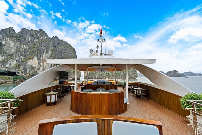 Hanoi to Ha Long Symphony Cruise with Limousine and Local Lunch - Lunch and the calm waters of Luon Cave