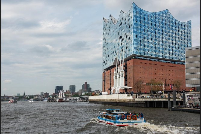 Harbor cruise on the beautiful Elbe - The container port and working Elbe