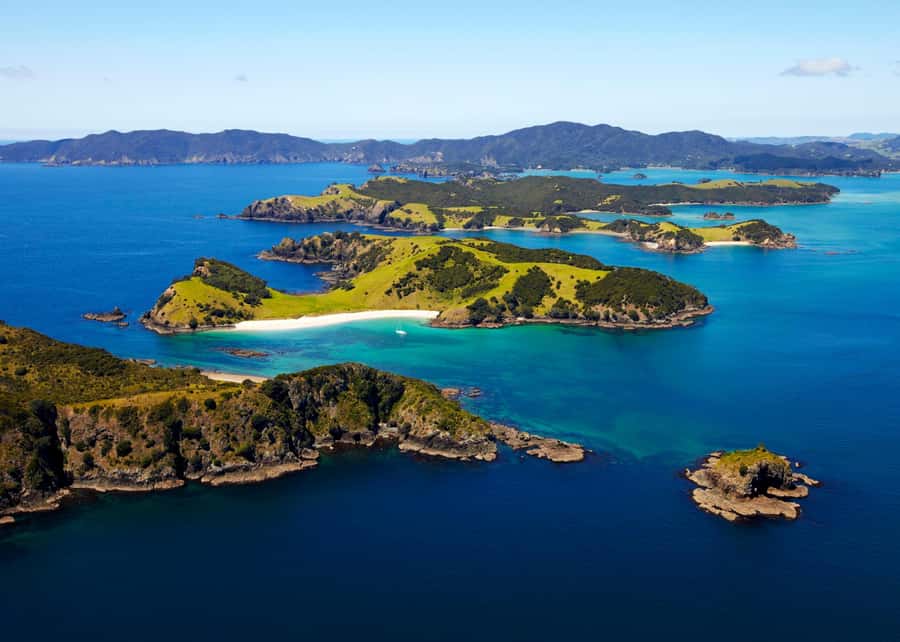 Hole in the Rock Tour & Bay of Islands Cruise - Cape Brett Lighthouse and the Coast Beyond
