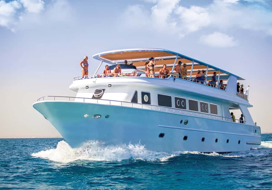 Hurghada: Luxury Orange Bay Cruise with Lunch and Pickup - First snorkeling stop: coral and clear-water time