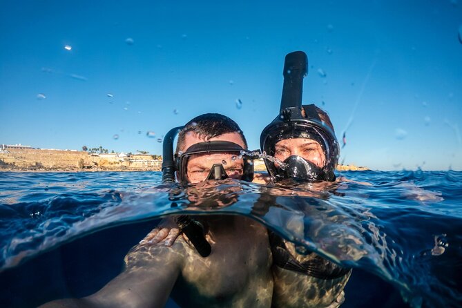 Hurghada Orange Bay boat Trip - Snorkeling over Red Sea coral