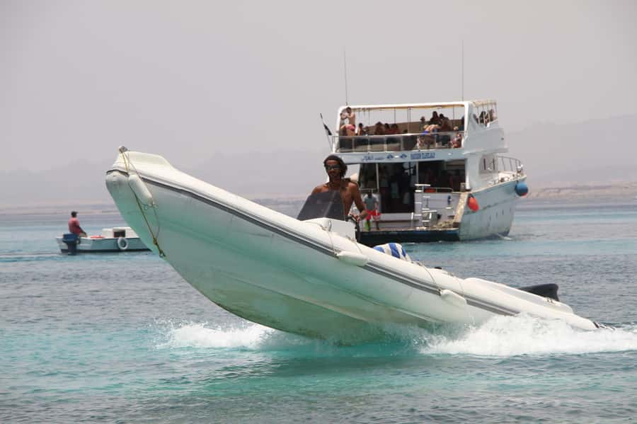 Hurghada: Private Speedboat to Orange Bay and White Island - Parasailing adds a short aerial view