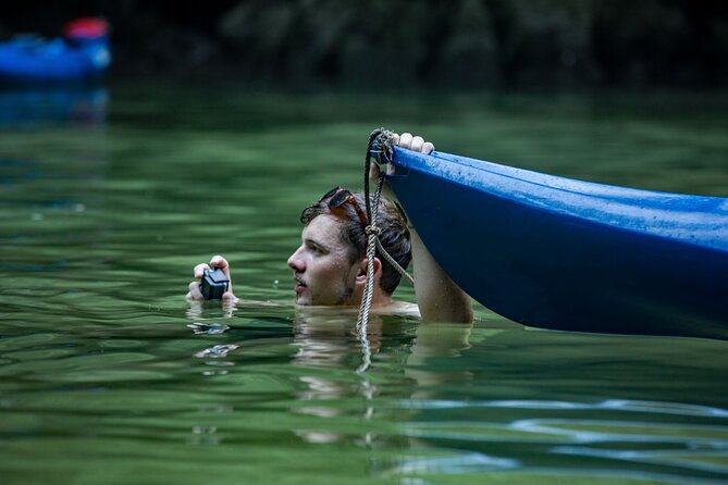 Kayaking at Lan Ha Bay - Paddling into lagoons, caves, and arches