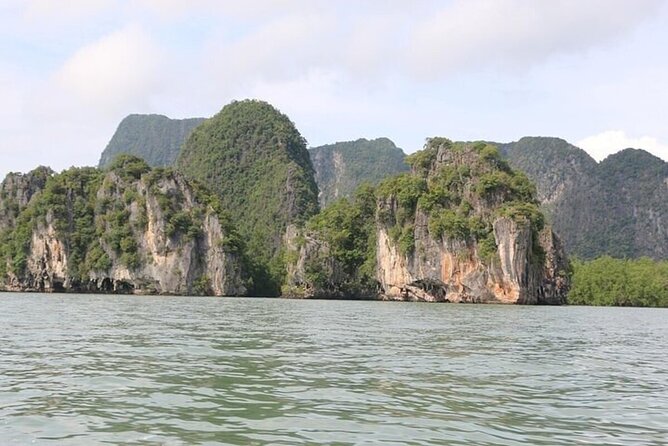 Khaolak Half Day: Phang Nga Bay, Tapu Island & Panyi Village Tour - Booking, weather, and cancellation details