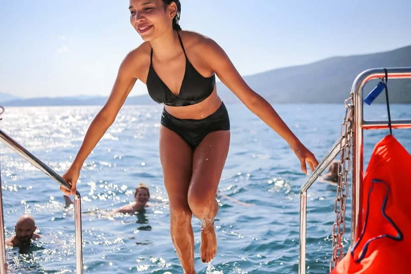 Kotor Bay: Full-Day Catamaran Cruise with Blue Cave Visit - Mamula, submarine tunnels, and Montenegro’s difficult past