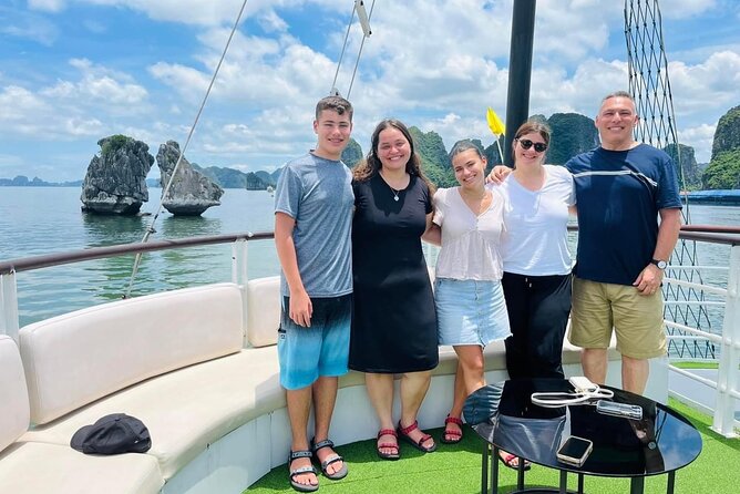 Light Cruise - Best Halong Bay Day Tour with Small Group on Boat - Boarding the Light Cruise at noon