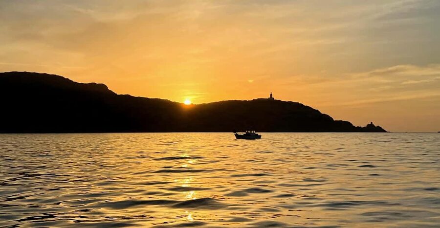 Lumio: Sunset Boat Tour in the Bay of Calvi - The swim and snorkeling stop near Spano