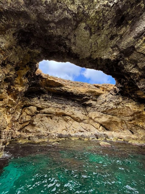 Malta: Gozo Comino and Blue Lagoon Boat Tour with Swim Stop - Comino’s caves from the water