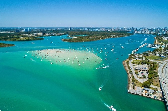 Miami Biscayne Bay Boat Tour with Sandbar Experience. - Kayaking near mangroves and raccoon country