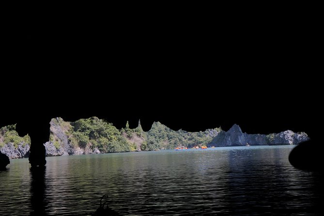 Most favorite full day boat tour with kayaking in Lan Ha bay, Ha Long bay - Kayaking through Dark-Bright Cave