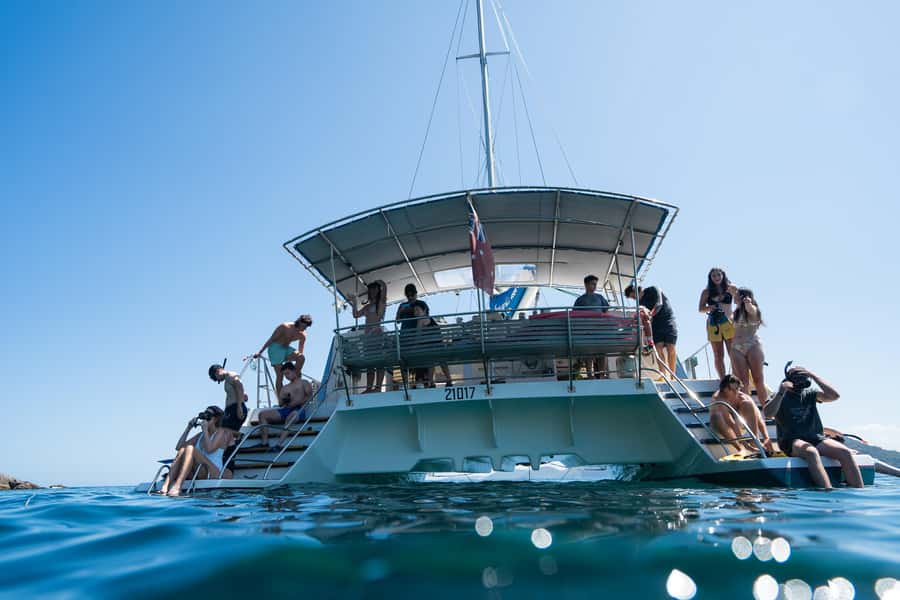 Nelson Bay: Marine Discovery Cruise with Snorkeling - Cruising Port Stephens with the coast in view