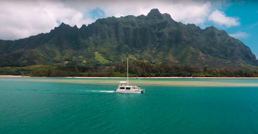 Oahu: Molii Fishpond and Kaneohe Bay Catamaran Tour - Kaneohe Bay with Kualoa Ranch in view