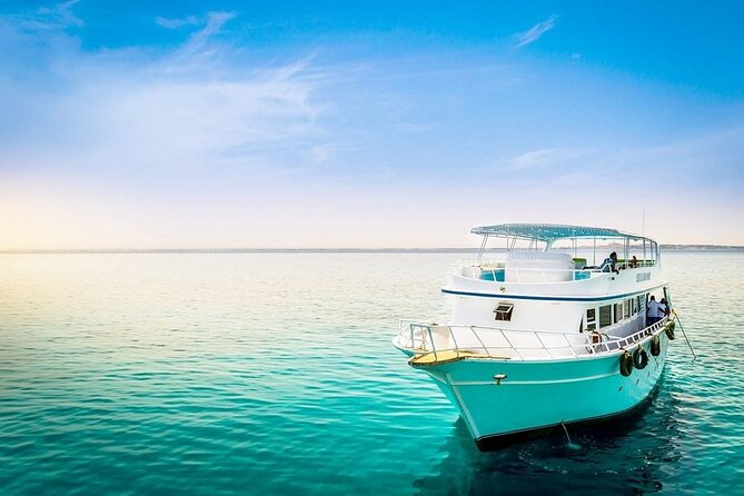 Orange Bay Island Boat Trip and Parasailing with Lunch - Hurghada - Banana and Quadra rides add the noise
