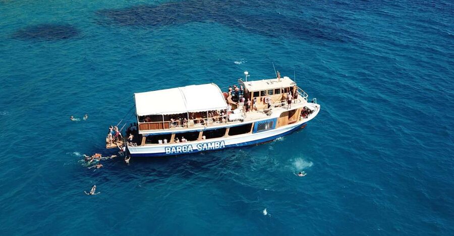 Palma de Mallorca: Palma Bay Boat Tour with Snorkeling - Setting out on the wooden Barca Samba