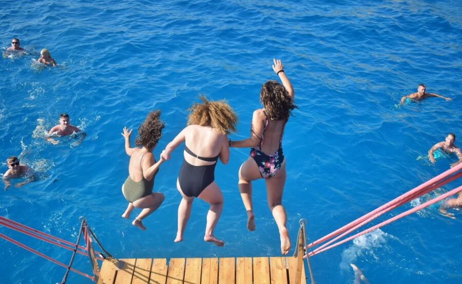 Palma de Mallorca: Palma Bay Boat Tour with Snorkeling - A party boat with a friendly, youthful feel