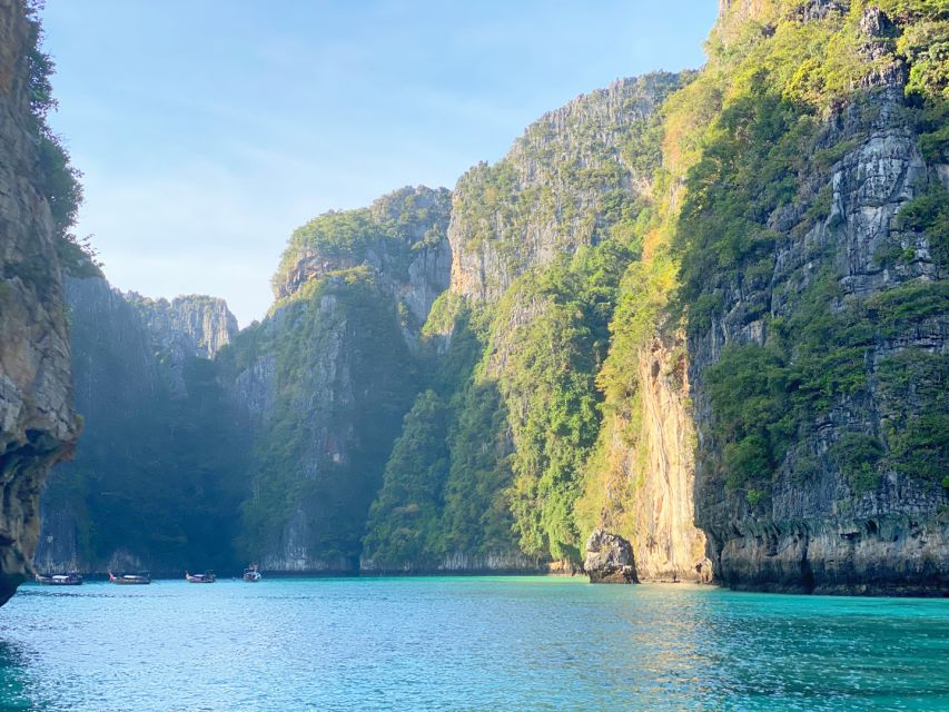 Phi Phi: Sunrise & Beat The Crowds to Maya Bay by Speedboat - Monkey Bay keeps the camera busy