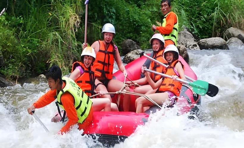 Phuket: Phang Nga Monkey Cave, Rafting & Zipline Day Tour - A jungle trek leading to a waterfall