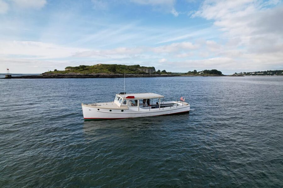 Portland: Casco Bay Lighthouse Sunset Cruise - Portland Head Light and the coastal view