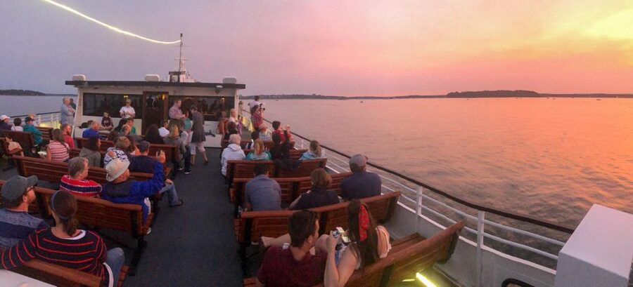 Portland: Casco Bay Sunset and Lighthouse Cruise - Passing lighthouses, forts, and island homes