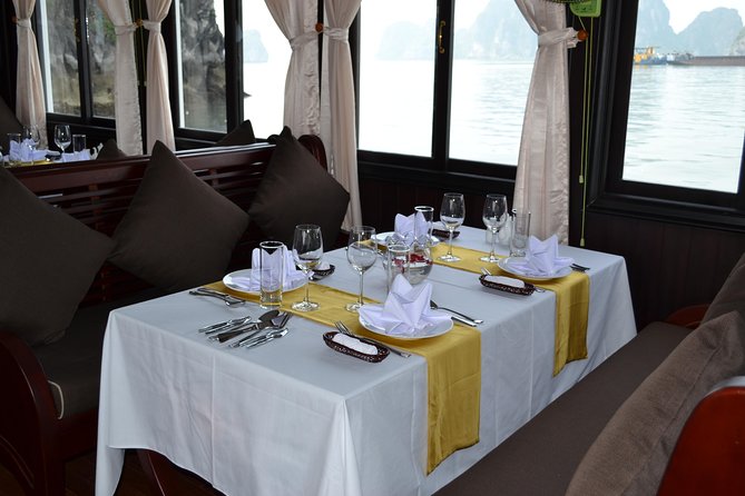 Private Full-Day Halong Bay Tour Including Cruise, Kayaking and Surprising Cave - Seeing Halong Bay from a traditional junk