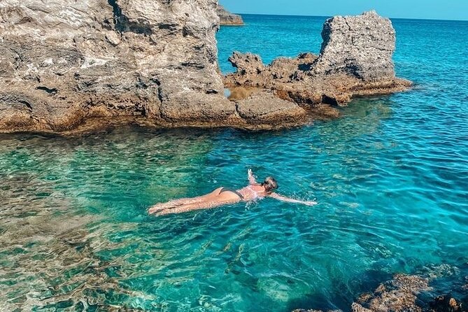 Rhodes Bay to Bay Swim Cruise-Greek Buffet w/wine included - Anthony Quinn Bay and snorkeling with small fish