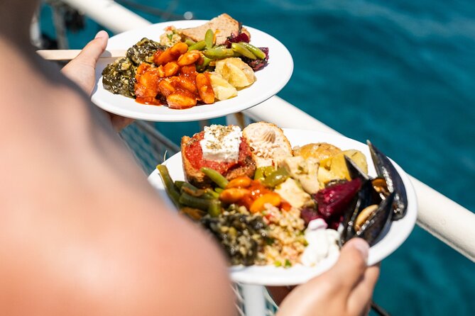 Rhodes Bay to Bay Swim Cruise-Greek Buffet w/wine included - Greek buffet lunch, wine, and what to expect