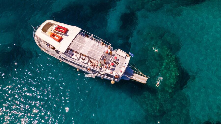 Rhodes: Bay to Bay Swim Cruise with Greek Buffet and Wine - Booking Advice for a Bay-Hopping Day