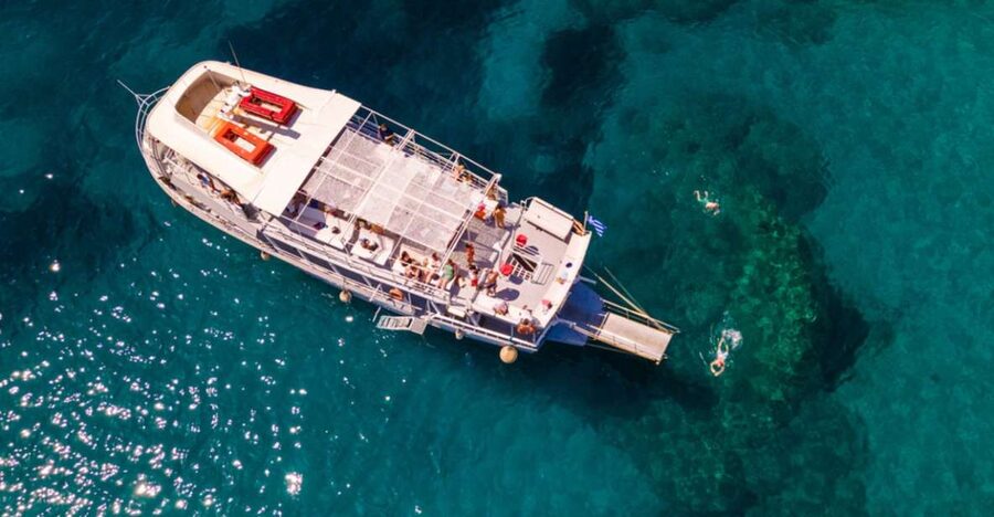 Rhodes: Bay to Bay Swim Cruise with Greek Buffet and Wine - Anthony Quinn Bay as the Final Stop