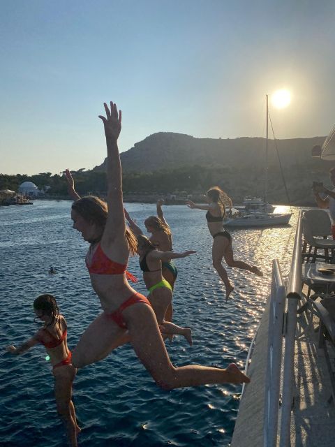 Rhodes: Bay to Bay Swim Cruise with Greek Buffet and Wine - Passing Faliraki and Ladiko Bay