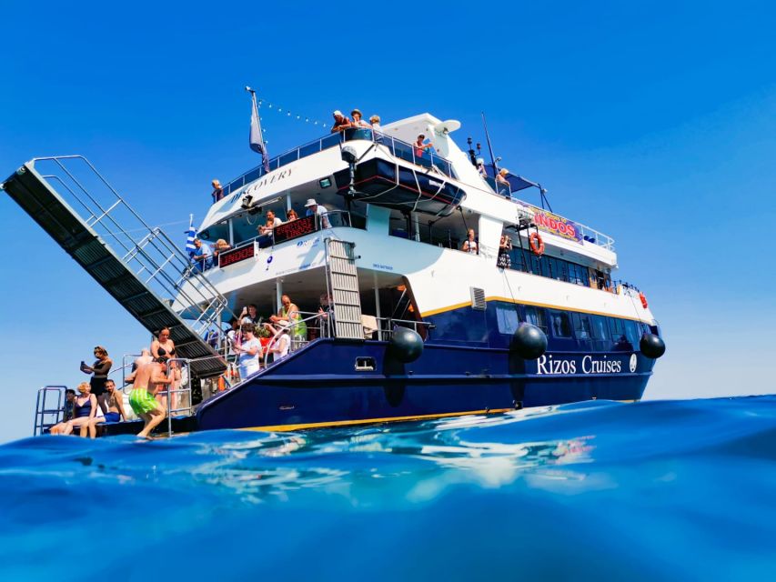 Rhodes Town: Boat Trip to Symi Island and St Marina Bay - Sailing past Rhodes toward St Marina Bay
