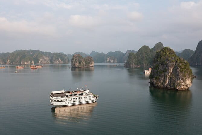 Rosy Cruise 3 Days Explore Halong Bay Lan Ha Bay Private Balcony - Van Boi Beach and the Floating Fish Farm