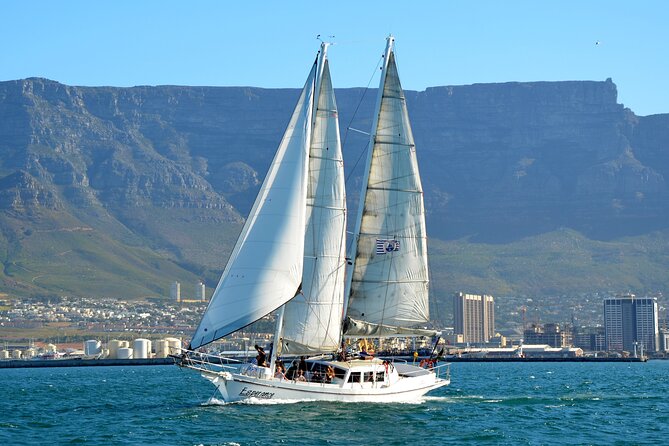 Sailing in Table Bay Cape Town aboard a Classic Schooner - Riding the bowsprit with Table Mountain behind you