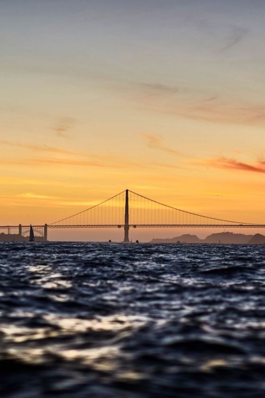 San Francisco: Golden Gate Bridge and Bay Sunset Cruise - Alcatraz appears from a broad bay view