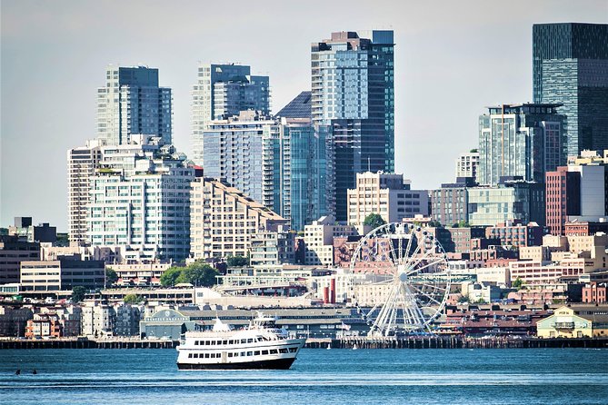 Seattle's Original Guided Harbor Cruise - The waterfront piers, aquarium, and Smith Tower