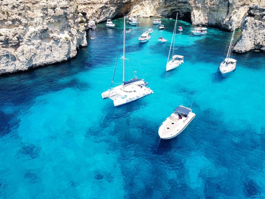St. Paul's Bay: Half-Day Scenic Catamaran Tour with Drinks - Crystal Lagoon and the quieter swim
