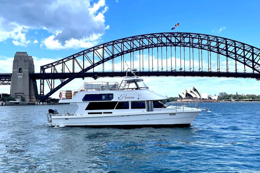 Sydney: Intimate Vivid Harbour Cruise with Canapes - Settling aboard Heaven