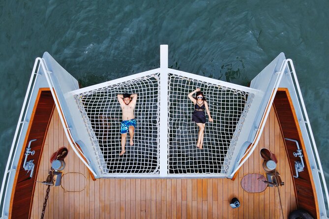 The Halong Catamaran Premium Day Cruise From Ha Long Bay - Bright-Dark Cave by kayak or bamboo boat