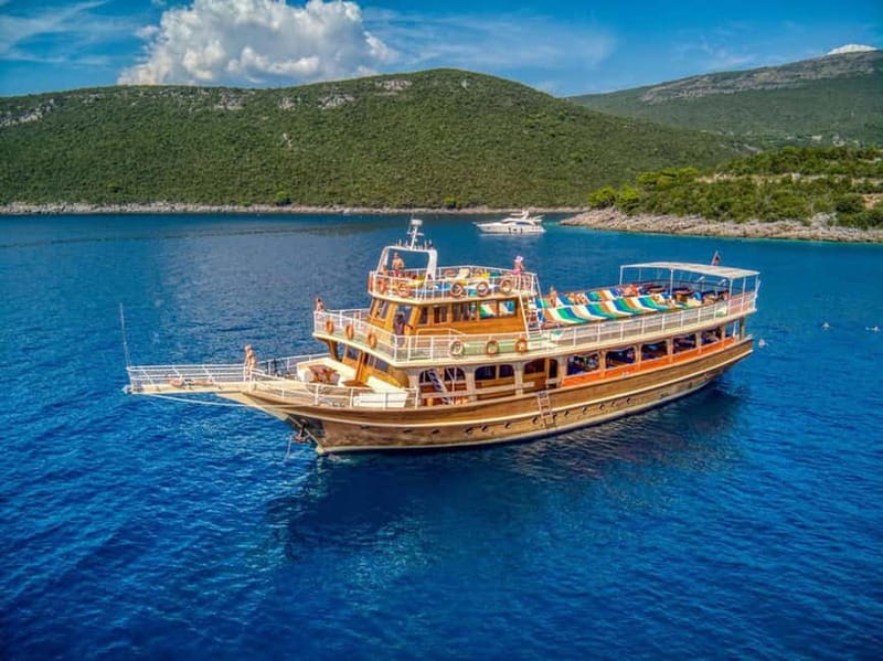 Tivat/Kotor: Boka Bay Full-Day Guided Cruise with Swim Stop - Our Lady of the Rocks and the view toward Perast