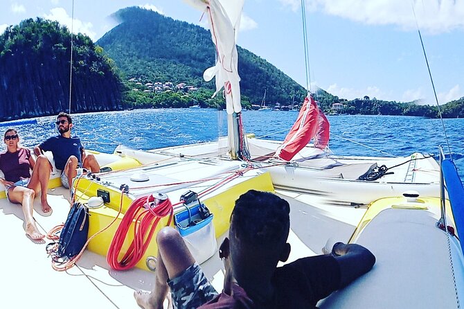 Two Hours of Sailing and Relaxation in the Bay of Saintes - Relaxing on the trampoline after the water