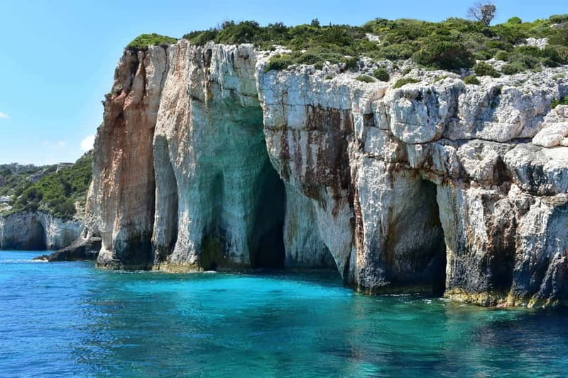 Zakynthos: Blue Caves and Navagio Bay Swim Cruise - Navagio Bay and the shipwreck photo stop